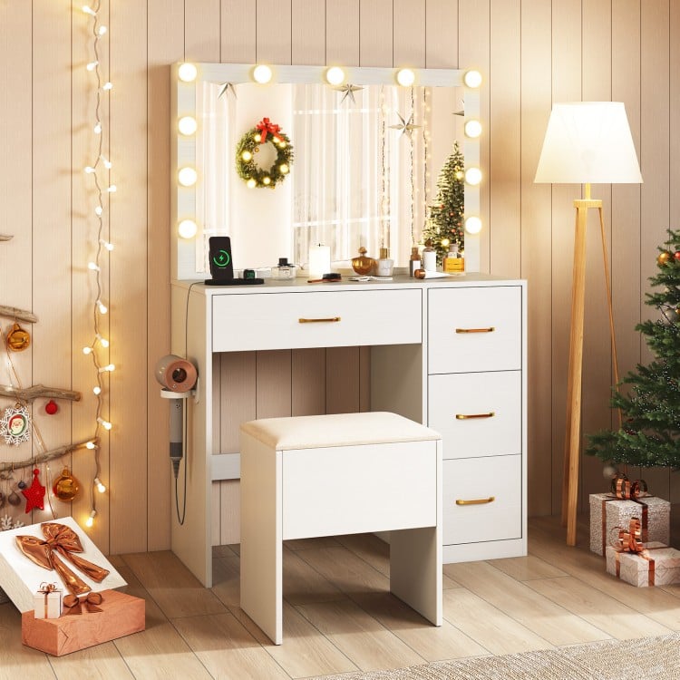Vanity desk with lighted mirror and drawers, featuring a padded stool, ideal for makeup application in a stylish.