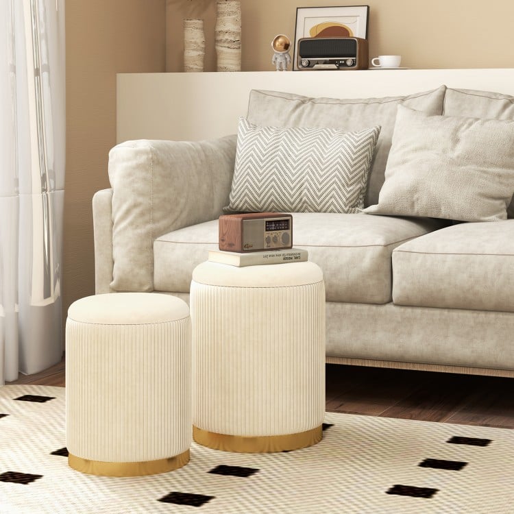 Round velvet and linen storage ottoman set of 2 with gold stainless steel base, ideal for living room or bedroom use.