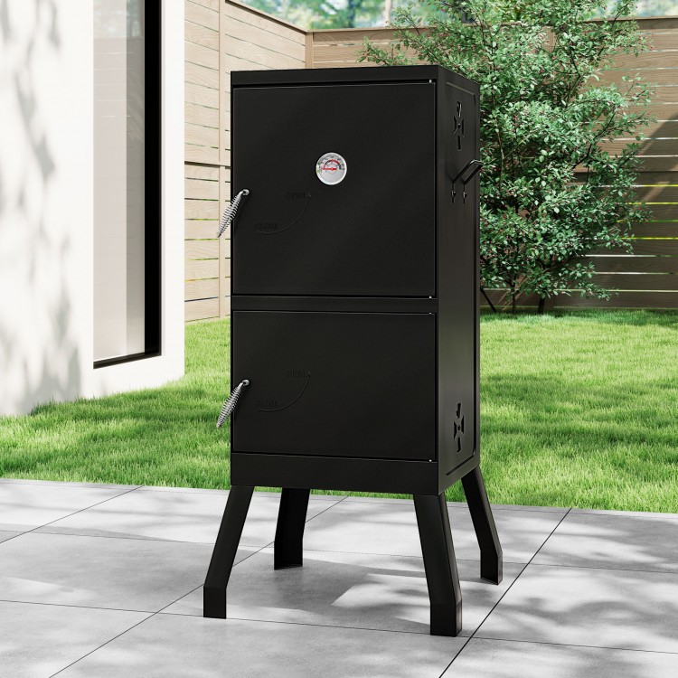 Vertical outdoor barbeque grill with separate doors for easy charcoal access and lockable design for heat retention.