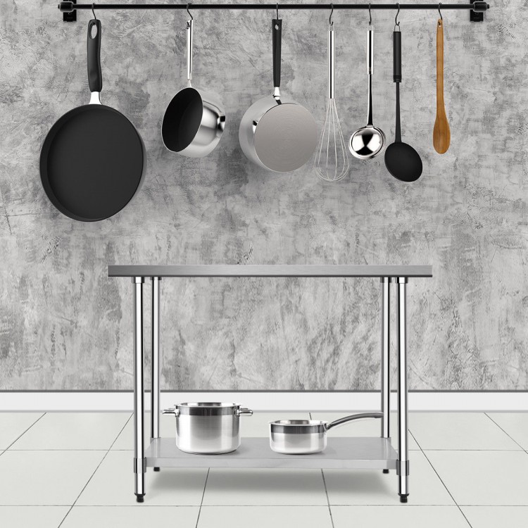 Stainless steel commercial kitchen worktable, 30x48 inches, with adjustable shelf and sturdy frame for versatile use.