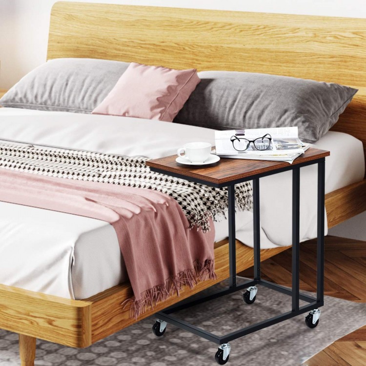 Mobile side table with a brown wood top and metal frame, ideal for bedside or sofa use, featuring rolling casters.