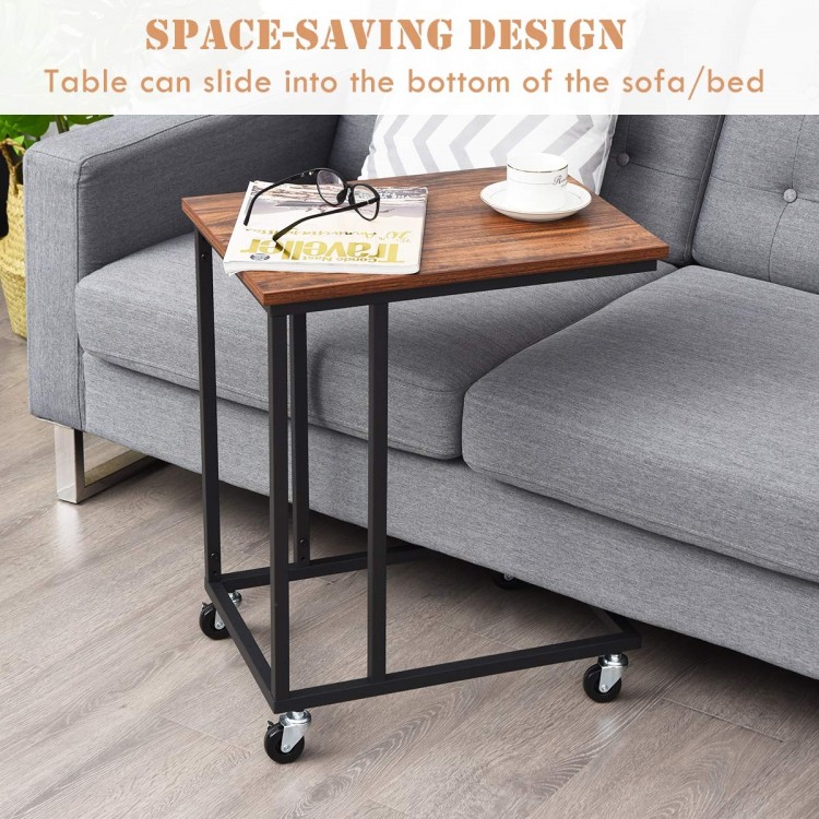 Mobile side table with brown wood top and metal frame, designed to slide under sofa or bed for versatile use.
