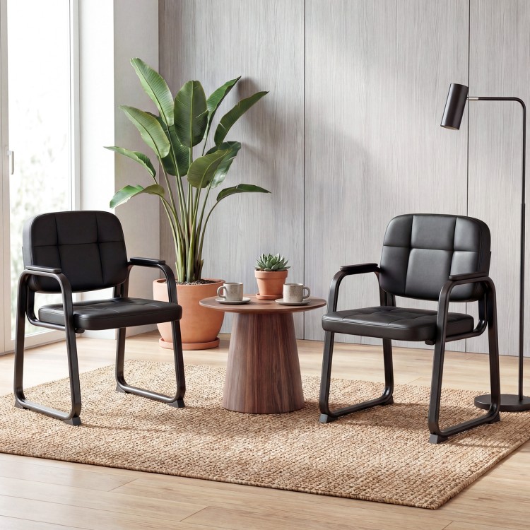 Set of 2 leather office reception chairs with cushioned seats and ergonomic backrests, ideal for waiting rooms.