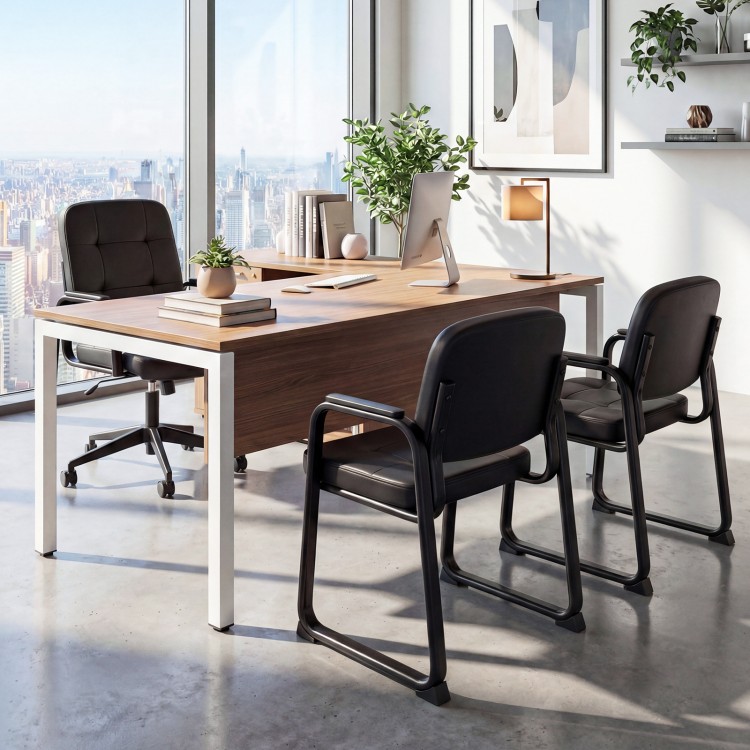 Set of four leather office reception chairs with cushioned seats and ergonomic backrests for comfortable waiting areas.