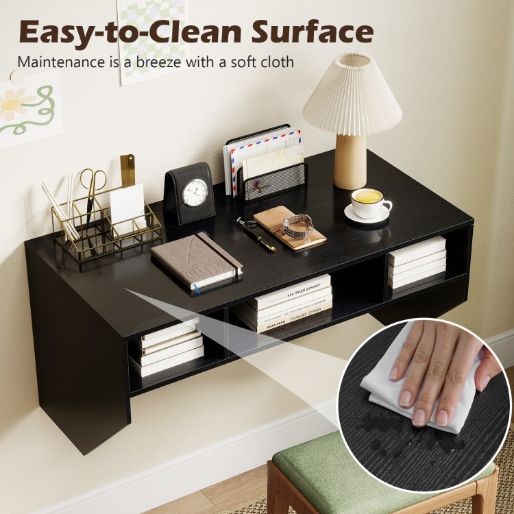 Wall-mounted black computer desk with three storage compartments, featuring an easy-to-clean surface for modern.