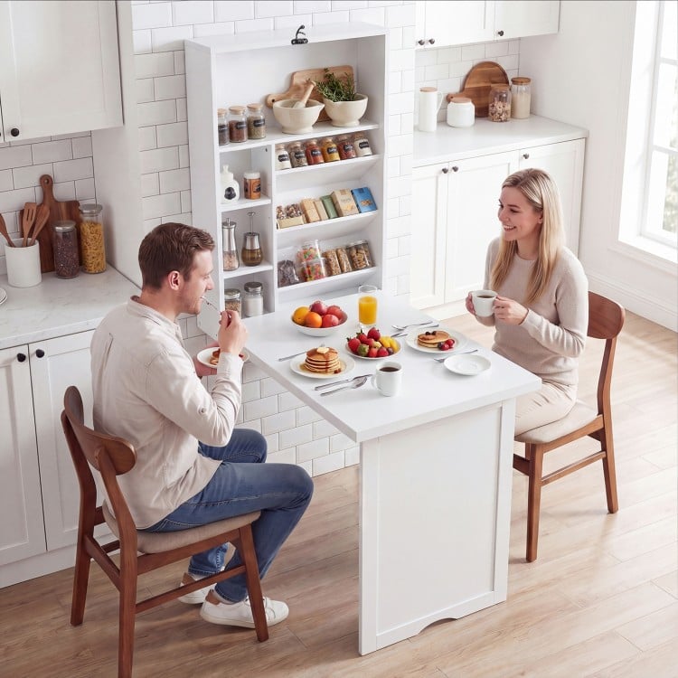 Wall-mounted fold-out convertible desk in white, featuring a wide tabletop and ample storage for various needs.
