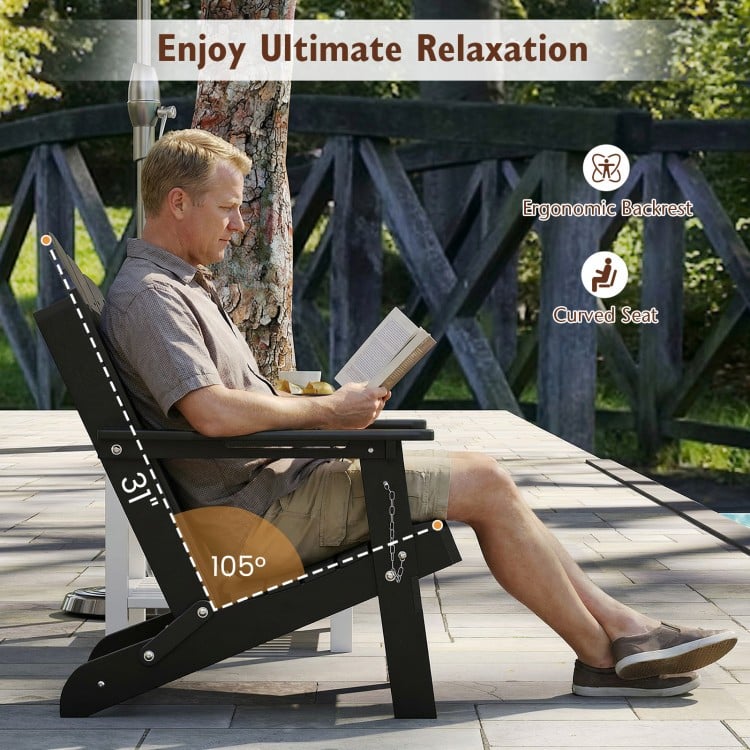 Black HDPE folding Adirondack chair with high backrest and cup holder, perfect for backyard relaxation and comfort.