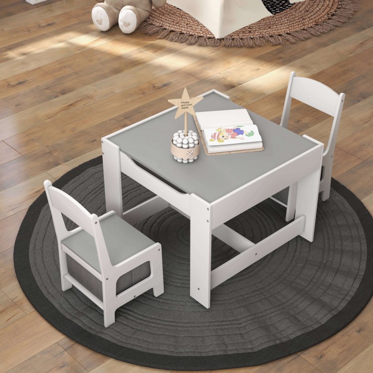 Kids table and chairs set in white with a gray top, featuring storage boxes and a 2-in-1 drawing surface for creative.