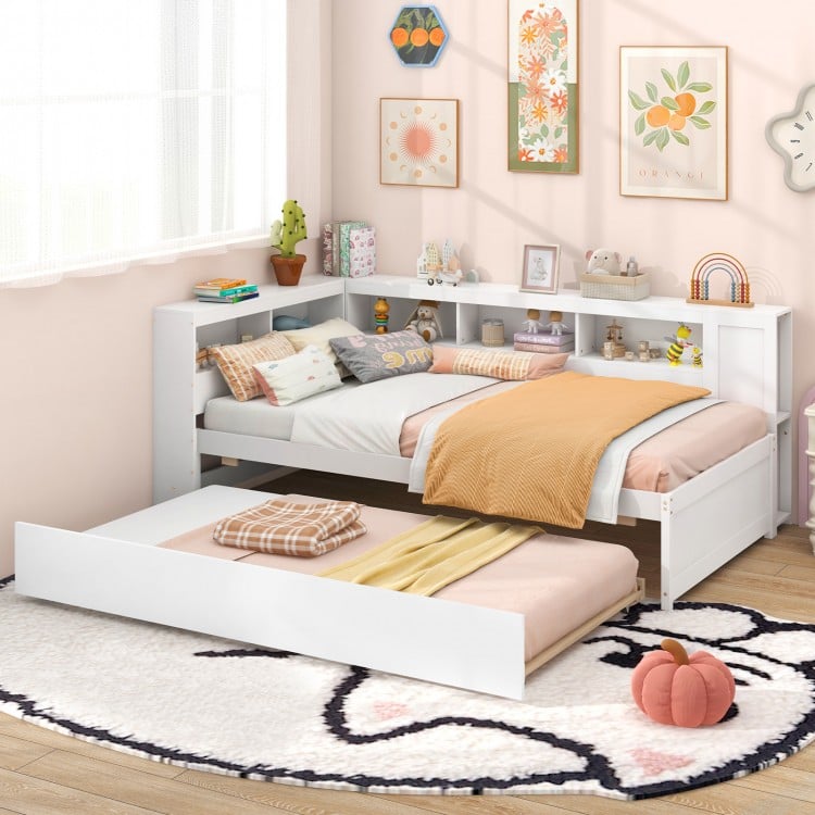Twin size daybed with trundle in white, featuring a bookshelf headboard and ample storage for kids' rooms.