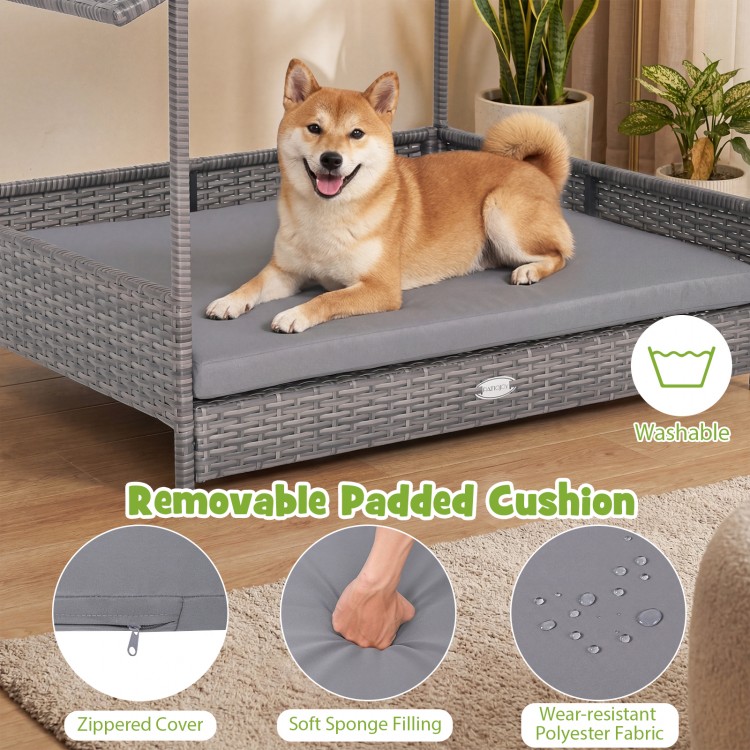 Elevated gray wicker dog bed with canopy, featuring a removable padded cushion for comfort and weatherproof protection.