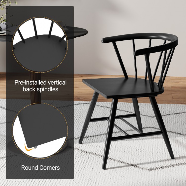 Windsor dining chair with ergonomic spindle back, sleek black finish, and round corners, perfect for kitchens and.