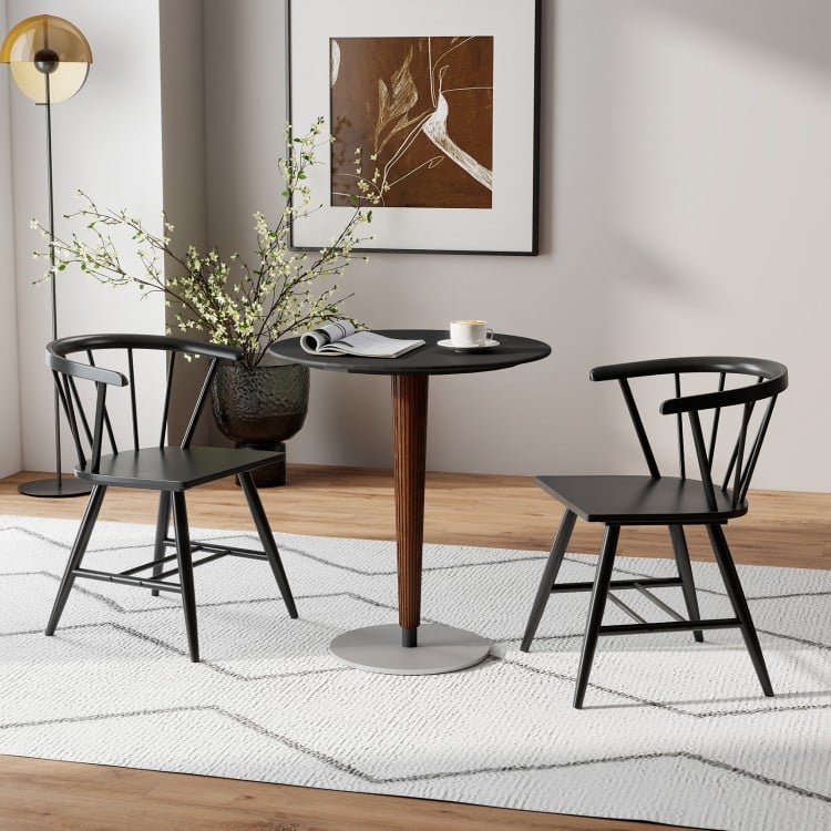 Windsor dining chair set in black with ergonomic backrest, perfect for kitchens and dining rooms.