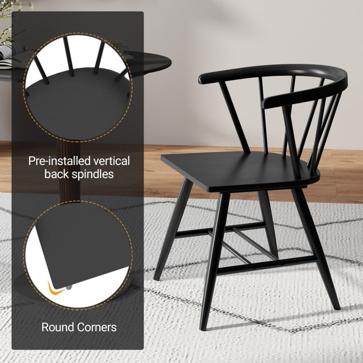 Windsor dining chair with ergonomic back spindles in sleek black finish, perfect for kitchens and dining rooms.