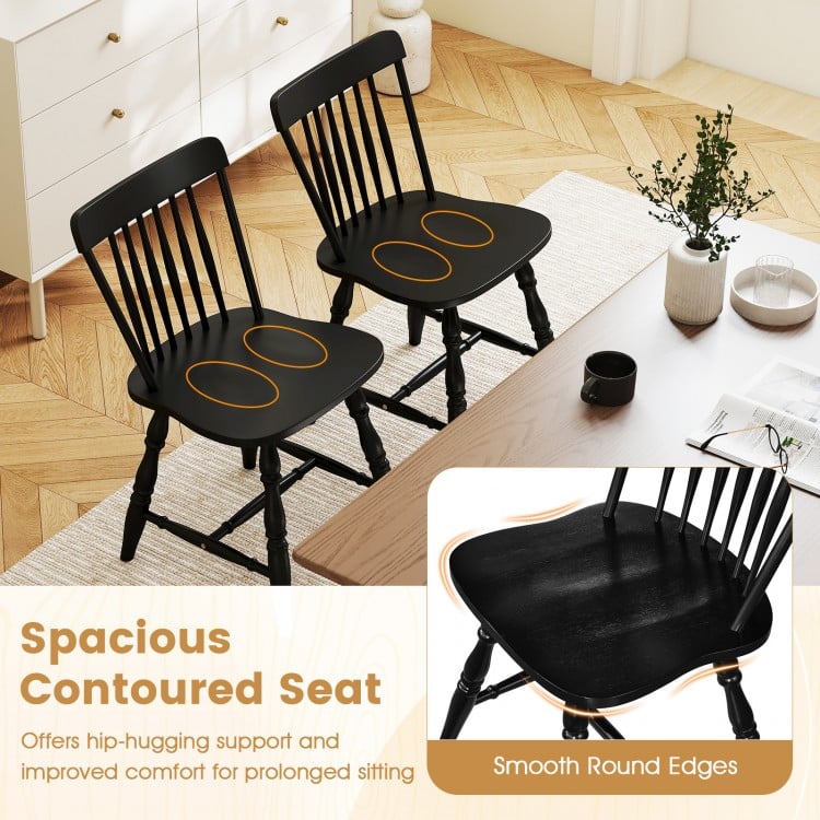 Set of 2 Windsor dining chairs in black with contoured seats and curved spindle backs for enhanced comfort and support.