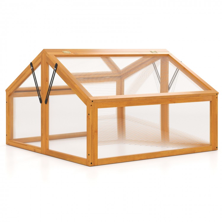 Wood cold frame greenhouse with transparent PVC panels and adjustable roof vents for plant protection and airflow.