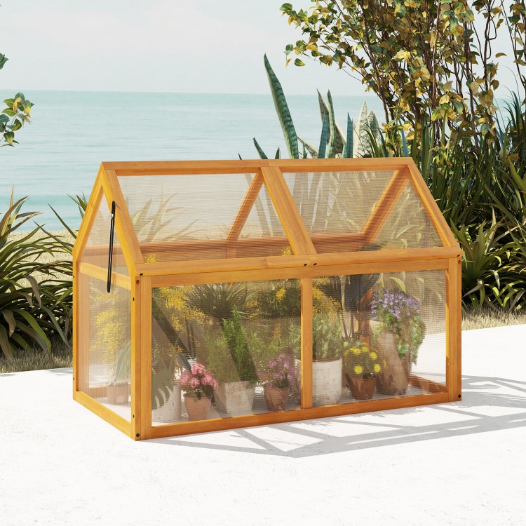 Wood cold frame greenhouse featuring a spire roof design, transparent panels, and a sturdy fir wood frame for plant.