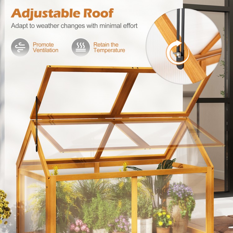 Adjustable roof of the wood cold frame greenhouse with transparent panels for ventilation and temperature control.