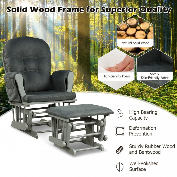 Wood glider and ottoman set in dark gray with padded armrests, featuring a sturdy wood frame for comfortable gliding.