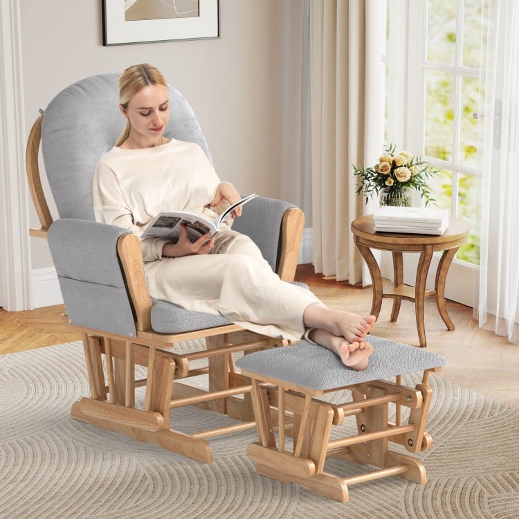 Glider chair with high backrest and padded armrests, featuring a detachable cushion for enhanced comfort during.