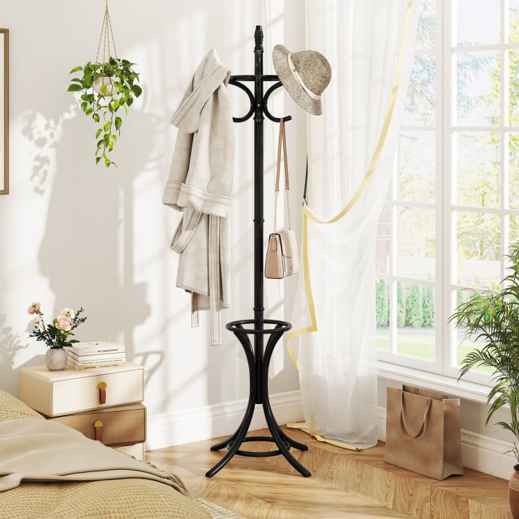 Wood standing coat rack with umbrella stand in black, showcasing a hollow-out design and elegant curved hooks for stylish functionality.
