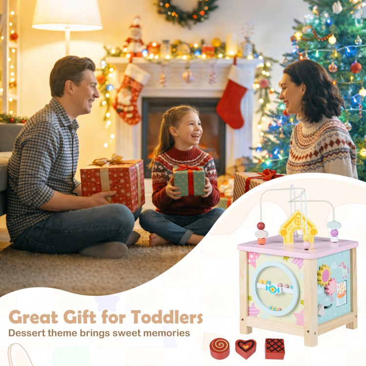 Wooden activity cube for toddlers featuring a dessert theme, shape matching blocks, and hidden storage for organized.