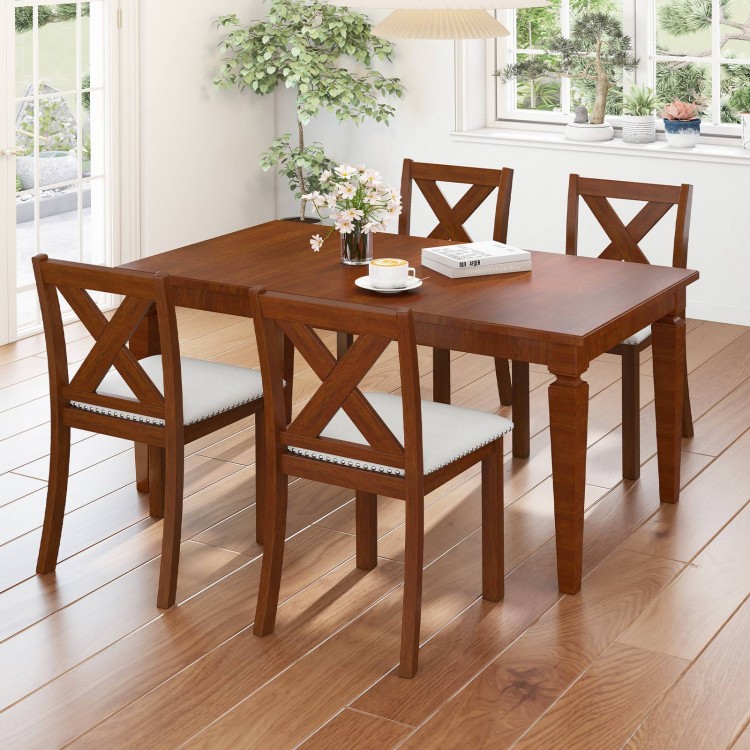 Wooden dining chair set featuring padded beige seats and X-shaped backs, perfect for creating a cozy dining atmosphere.