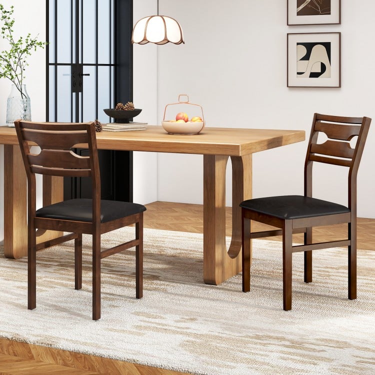 Wooden dining chair set of 2 with PU leather padded seats and rubber wood frames, perfect for dining rooms and cafes.