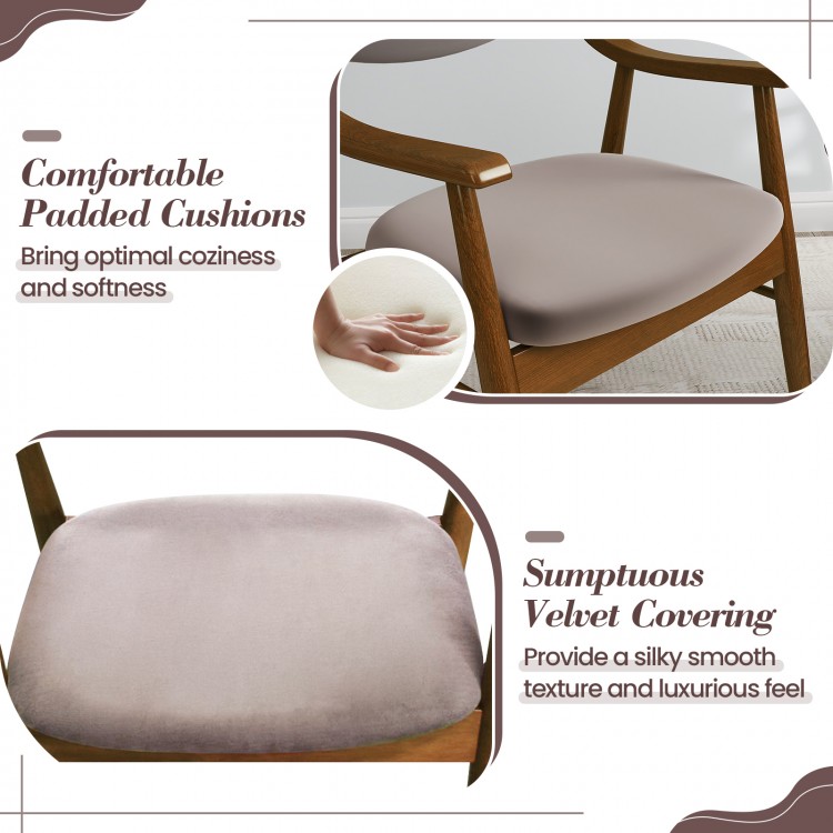 Close-up of the padded seat with sumptuous velvet covering on a walnut wooden dining chair, offering optimal coziness.