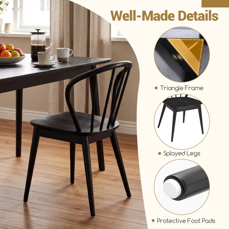 Black wooden dining chair showcasing a high spindle back, sturdy rubber wood, and protective foot pads for secure.