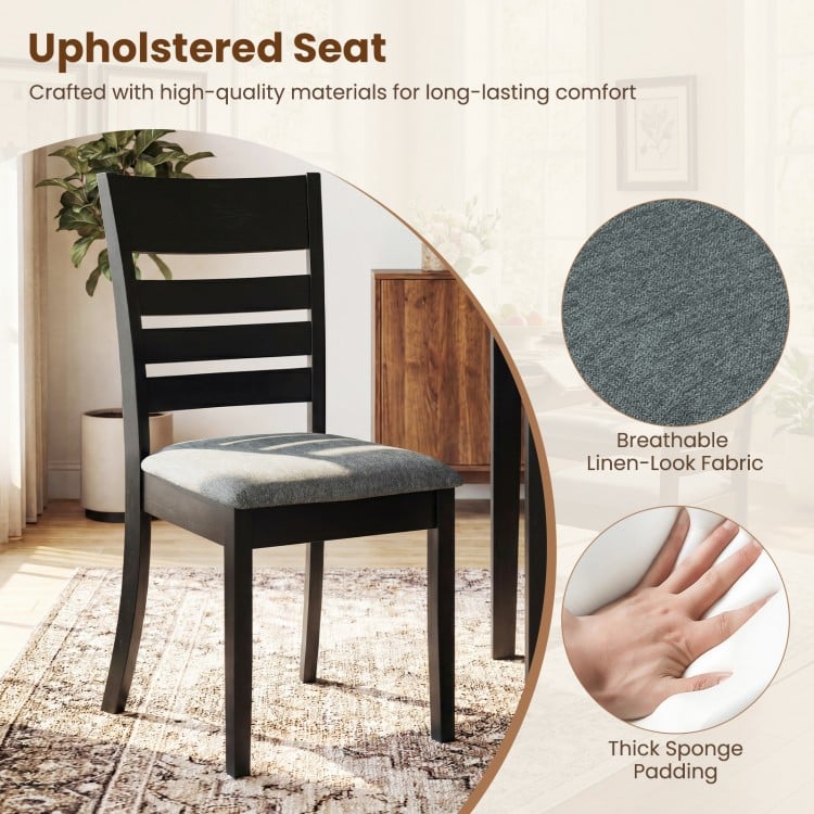 Black wooden dining chair with upholstered seat, slatted backrest, and thick sponge padding for comfort and durability.