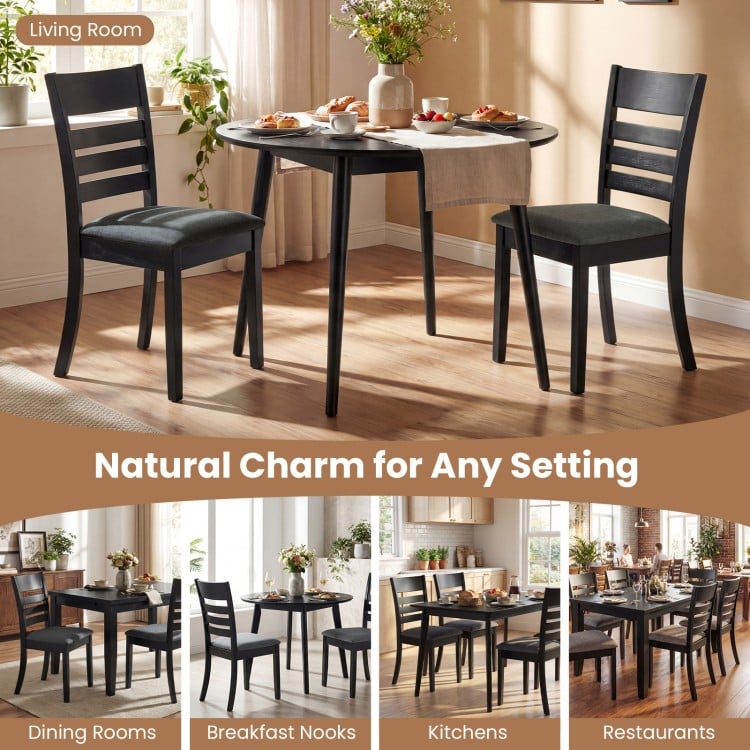 Set of 2 black upholstered wooden dining chairs with rubber wood frame, perfect for kitchens or dining rooms.