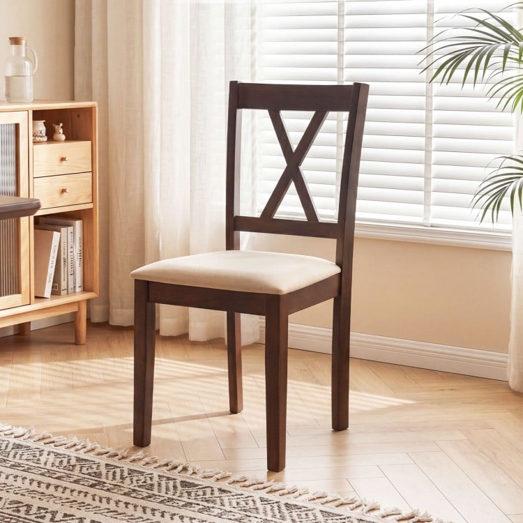 Walnut wooden dining chair with upholstered seat and ergonomic backrest, ideal for kitchens and dining rooms.