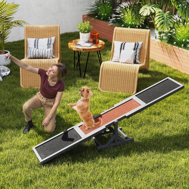Wooden dog agility seesaw in gray, crafted from spruce wood, designed for outdoor obstacle courses and dog training.