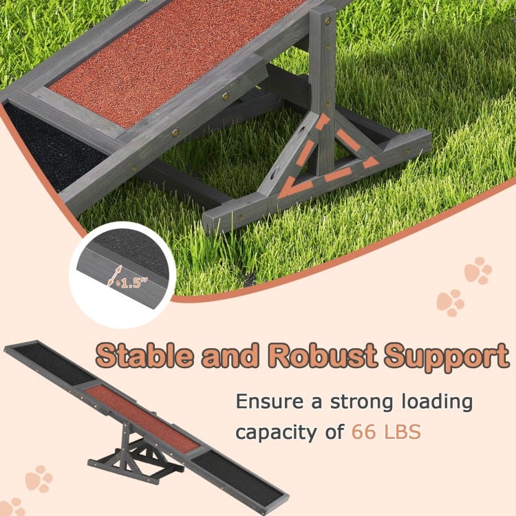 Wooden dog agility seesaw with a sand grain asphalt surface, supporting up to 66 lbs for outdoor training and exercise.