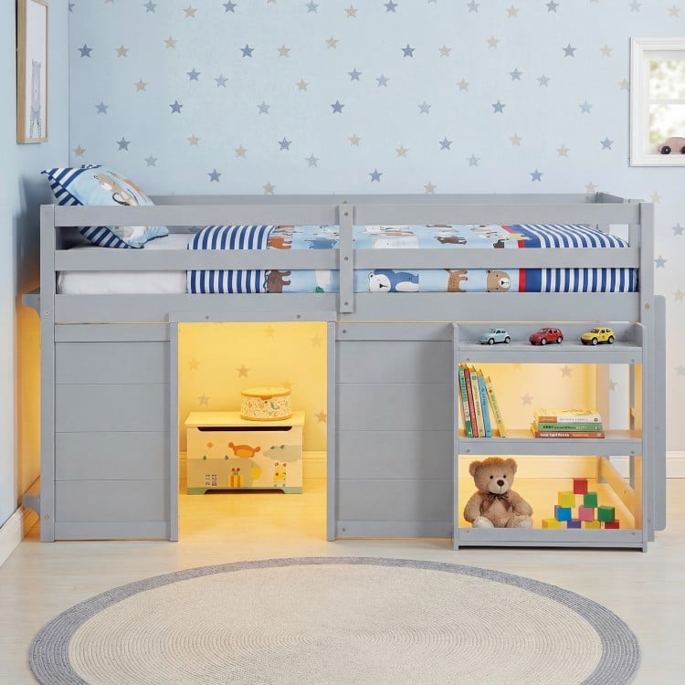 Gray wooden low kids loft bed with LED lights, under-bed play area, and ample storage for toys and books.