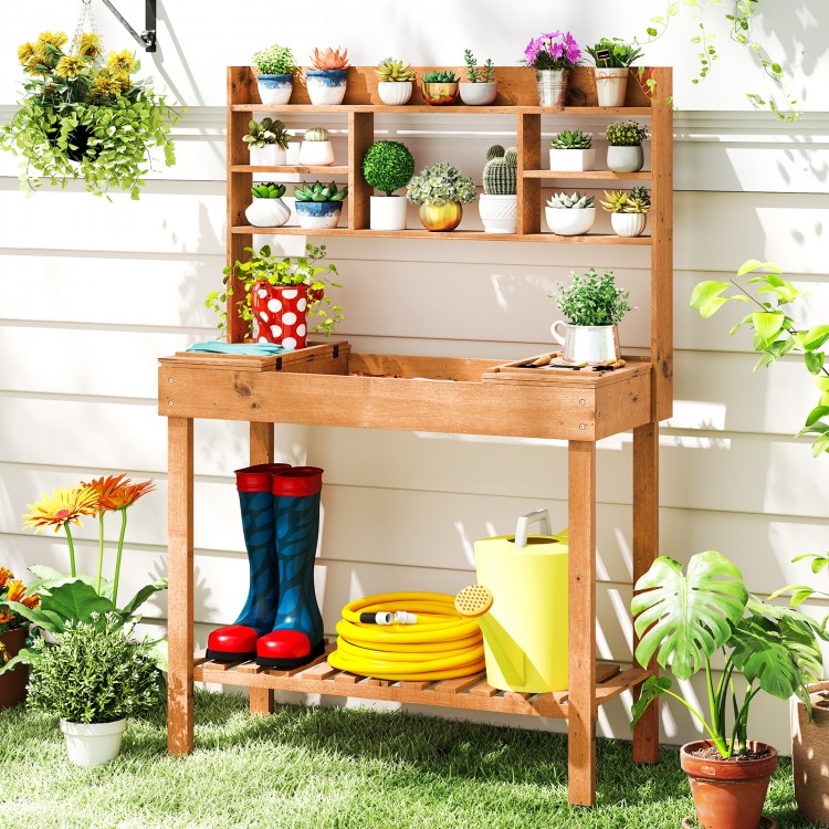 Wooden potting bench with 3-tier shelf and flip-up tabletop, perfect for gardening tasks in patios or gardens.