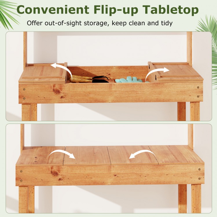 Flip-up tabletop of the wooden potting bench, showcasing hidden storage for tools and a sturdy design for gardening.