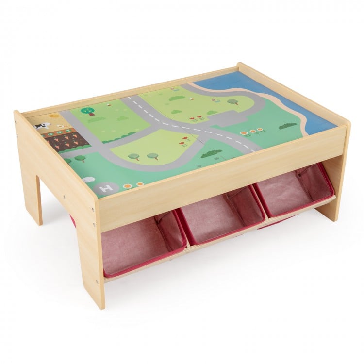 Wooden train set table with reversible tabletops and 3 fabric drawers for kids' toys, promoting creativity and play.