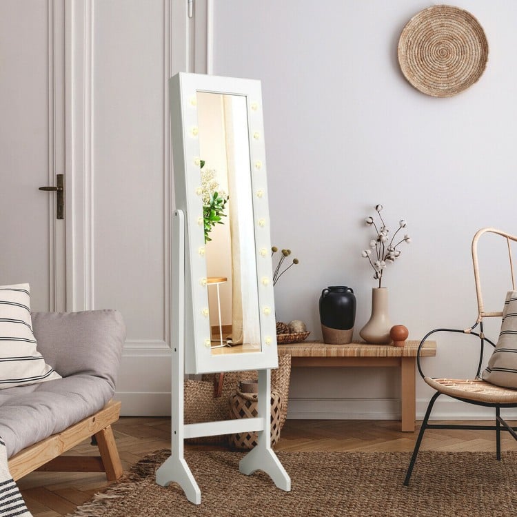Full-length mirrored jewelry cabinet armoire in white with LED lights, featuring storage for earrings, rings, and.