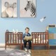 Brown 2-in-1 classic convertible toddler bed with guardrails, designed for safety and independence in a playful room.