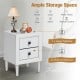 White retro bedside nightstand with two pull-out drawers and a large tabletop for decor, perfect for space-saving.