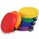Multicolor 15-inch round toddler floor cushions with ergonomic handles, perfect for kids' comfort and color recognition.