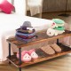 Industrial vintage coffee table displaying folded clothes and plush toys on its double-tier shelf, ideal for stylish.