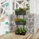 3-tier freestanding vertical plant stand with durable PP pots, ideal for indoor and outdoor gardening use.