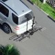 2-bike hitch mount bike rack in black, adjustable for 1-1/4" or 2" receivers, designed for SUVs and trucks.