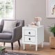 White retro bedside nightstand with two drawers and exquisite handles, perfect for space-saving storage in any room.