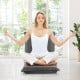 Adjustable gray floor chair in a meditative pose, featuring 6 positions for comfort in any setting.