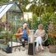 Portable steel tabletop patio heater with glass tube, 10000 BTU, ideal for outdoor gatherings and compact spaces.