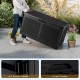 Black 100-gallon resin deck box with rattan texture, featuring wheels and side handles for easy outdoor storage.