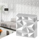 3D wall panel in white PVC with diamond accent, ideal for DIY interior decoration in living rooms or offices.